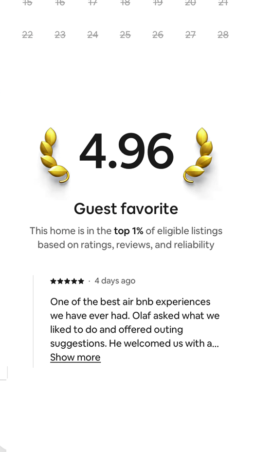 Airbnb listing showing 4.96 rating, Guest Favorite badge, and Top 1 percent ranking.